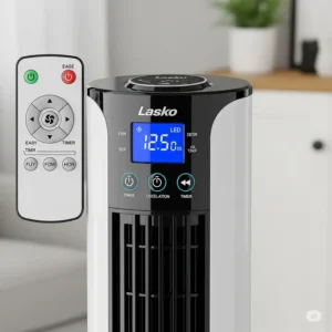 Close-up of the user-friendly digital display and remote control for a Lasko tower fan, illustrating easy setting adjustments.