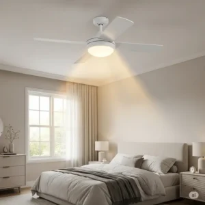 Compact 44 inch ceiling fan with light illuminating a comfortable bedroom space