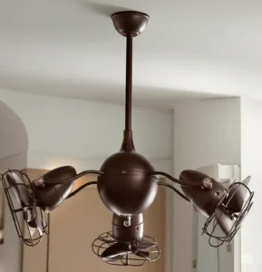 A unique multi-head ceiling fan in a matte bronze finish, featuring three small, caged, and adjustable fan heads.
