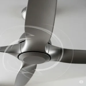 Close-up of aerodynamically designed blades on an oscillating ceiling fan, enhancing air circulation.