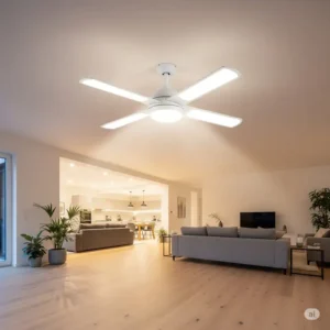 Modern white ceiling fan with integrated LED lights illuminating a spacious living room, providing both airflow and ambient lighting.