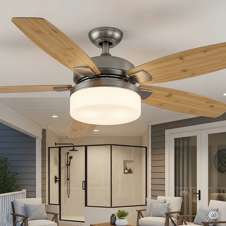 A damp-rated coastal ceiling fan with moisture-resistant components, suitable for use in a humid bathroom or covered porch.