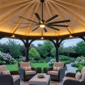 An elegant 84-inch ceiling fan installed in the center of an outdoor gazebo, creating a comfortable space.