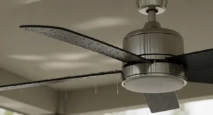 A close-up view of the weather-resistant blades and a brushed nickel finish on a 20-inch outdoor ceiling fan.