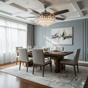 Modern chrome ceiling fan acting as a gorgeous chandelier over a formal dining room table.