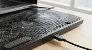 Close-up of a durable metal mesh surface on a USB laptop cooling pad designed for optimal airflow.