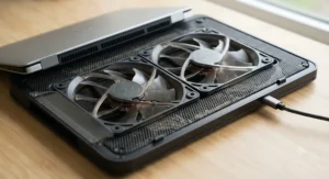 Close-up of the large dual fans inside a quiet best laptop cooling pad designed to prevent overheating.