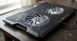 Close-up view of USB-powered laptop cooling pad fans showing the airflow intake mesh