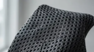 A close-up diagram showing the moisture-wicking fabric and ventilation features of the best cooling hat.